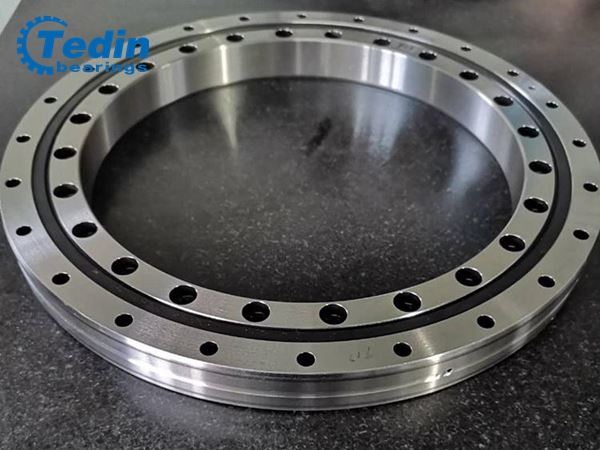 The surface treatment of crossed roller bearing.